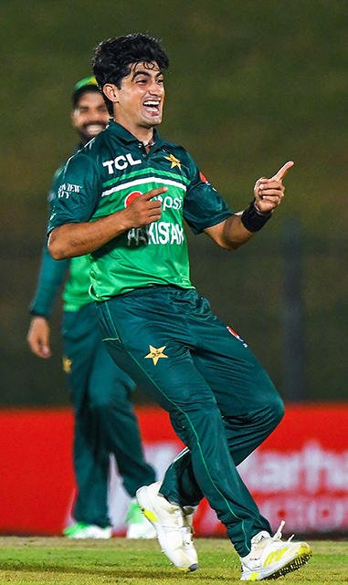 Naseem Shah celebrates his first wicket